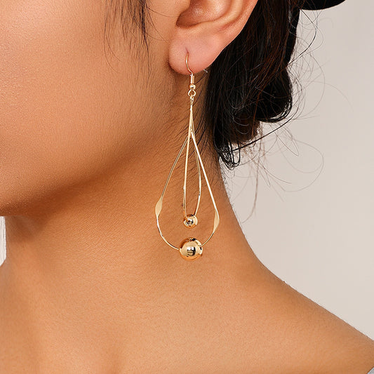 Female French Style Temperament Hollow Water Drops Tassel Long Earrings